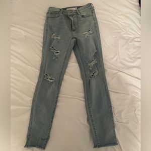 Blue ripped skinny jeans